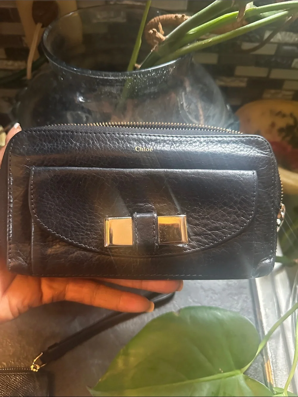 Chloé Black Leather Zip Wallet with Gold Bow Accent